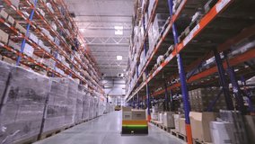 Autonomous mobile robots operate in a large modern alcoholic beverage warehouse, without people. Automated warehouse, from the inside. Futuristic warehouse concept. - Powered by Shutterstock - Get 15% off with code: PIKWIZARD15