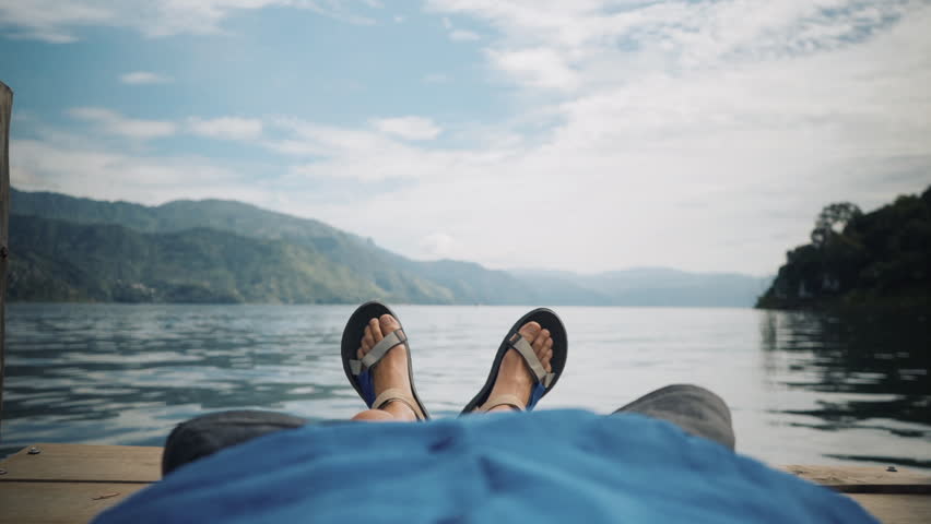 POV Person Relaxing Near a Beautiful Peaceful Lake, Lake Atitlan, Guatemala
