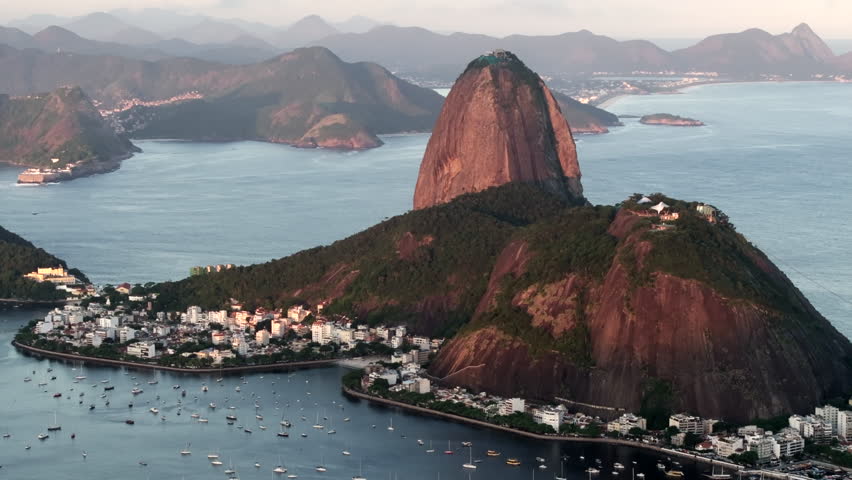 Aerial view of natural landmark Sugarloaf Mountain at sunset in Rio de Janeiro, Brazil.