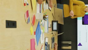 World map animation over diverse team having meeting in conference room. Teamwork, collaboration, business meeting, global, diversity, strategy - Powered by Shutterstock - Get 15% off with code: PIKWIZARD15