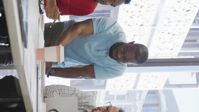 Business team collaborating at office with data processing animation overlay. Teamwork, collaboration, data analysis, innovation, brainstorming, corporate - Powered by Shutterstock - Get 15% off with code: PIKWIZARD15