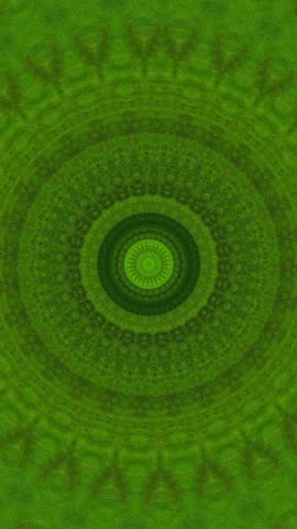 Revolving green kaleidoscope hypnotic nature-inspired media background VERTICAL