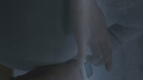 Animation of data processing on screens over caucasian pregnant woman checking smartwatch. Lifestyle, data processing, communication and technology concept digitally generated video. - Powered by Shutterstock - Get 15% off with code: PIKWIZARD15