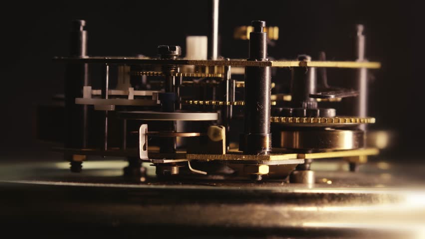 Wind up Clock internal brass mechanism oscillating rhythm MACRO SIDE view