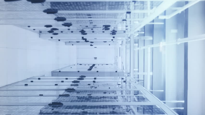 Animation of social media icons floating against mosaic squares over computer server room. Social media networking and business data storage technology concept