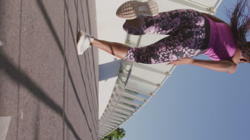 Animation of web globe icons against african american fit woman running on the city bridge. Global networking and business technology concept - Powered by Shutterstock - Get 15% off with code: PIKWIZARD15