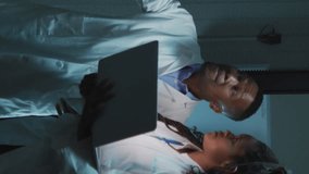 Animation of notification bars over diverse engineers discussing on laptop in server room. Digital composite, multiple exposure, social media, teamwork, data center, networking, technology concept. - Powered by Shutterstock - Get 15% off with code: PIKWIZARD15