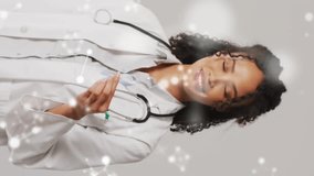 Animation of molecules over smiling female doctor. Global medicine, connections, computing and data processing concept digitally generated video. - Powered by Shutterstock - Get 15% off with code: PIKWIZARD15