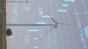 Wind turbines on landscape with financial data processing animation over them. Renewable, energy, technology, sustainability, environment, economics - Powered by Shutterstock - Get 15% off with code: PIKWIZARD15