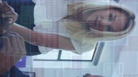 Business professionals working on laptop with digital binary code overlay animation. Technology, innovation, teamwork, data, computers, communication - Powered by Shutterstock - Get 15% off with code: PIKWIZARD15