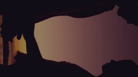 Animation of couple embracing over sunset. Holidays, free time and digital interface concept digitally generated video. - Powered by Shutterstock - Get 15% off with code: PIKWIZARD15