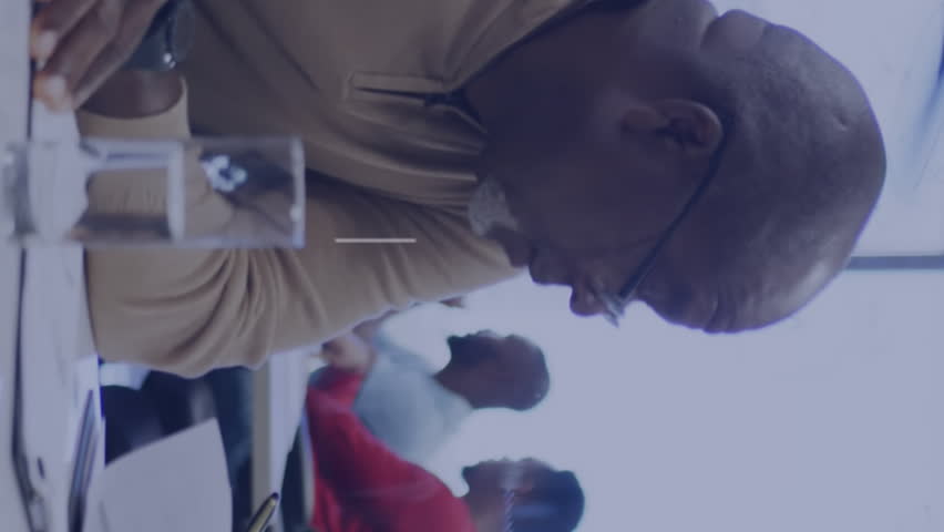 Animation of message boxes with icons and changing numbers, diverse coworkers discussing reports. Digital composite, multiple exposure, notification, business, teamwork, growth and technology. - Powered by Shutterstock - Get 15% off with code: PIKWIZARD15