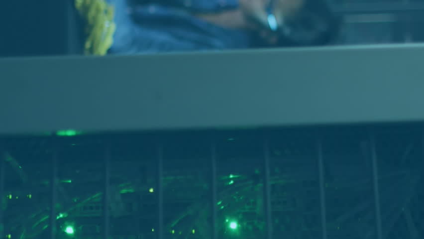 African american computer technicians are working in a business server room, using laptop computers to store and communicate digital information. Global business digital interface technology and - Powered by Shutterstock - Get 15% off with code: PIKWIZARD15