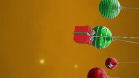 Animation of christmas baubles decoration and glowing spots on brown background. Christmas, festivity, celebration and tradition concept digitally generated video. - Powered by Shutterstock - Get 15% off with code: PIKWIZARD15