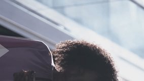 Animation of data processing over african american businesswoman using smartphone. Global connections, business, finance, data processing and digital interface concept digitally generated video. - Powered by Shutterstock - Get 15% off with code: PIKWIZARD15