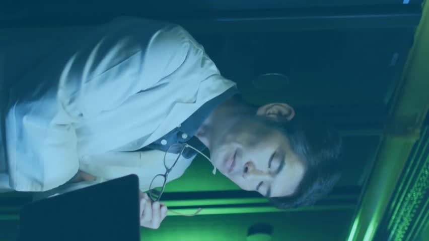 Analyzing data with digital interface, business professionals in server room working. Technology, networking, data analysis, team, collaboration - Powered by Shutterstock - Get 15% off with code: PIKWIZARD15