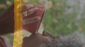 Drinking from red cup, elderly woman enjoying animation of sunset landscape. Senior, leisure, relaxation, virtual reality, technology, entertainment - Powered by Shutterstock - Get 15% off with code: PIKWIZARD15