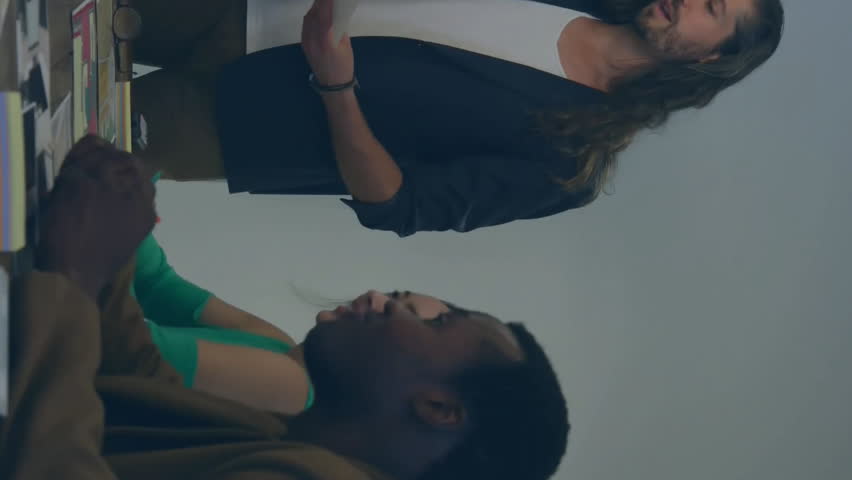 Business team collaborating with data processing animation overlay in office setting. Collaboration, teamwork, digital, innovation, technology, brainstorming - Powered by Shutterstock - Get 15% off with code: PIKWIZARD15