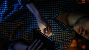 Using smartphone, man surrounded by blue chat bubbles in dark animation setting. Technology, digital, communication, networking, messages, virtual - Powered by Shutterstock - Get 15% off with code: PIKWIZARD15