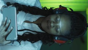 Animation of social media icons over african american woman working in server room. network, programming, computers and technology concept digitally generated video. - Powered by Shutterstock - Get 15% off with code: PIKWIZARD15