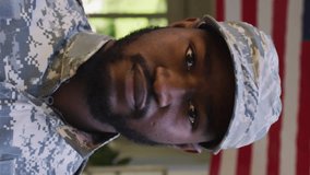 Animation of thank you over african american soldier looking at camera over flag of usa. American patriotism and freedom concept digitally generated video. - Powered by Shutterstock - Get 15% off with code: PIKWIZARD15