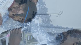 Animation of dna strand spinning over doctor and african american patient using oxygen mask. Global medicine, technology, data processing and digital interface concept digitally generated video. - Powered by Shutterstock - Get 15% off with code: PIKWIZARD15