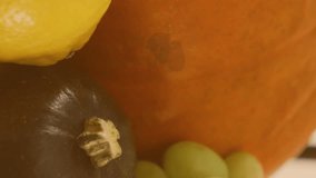 Animation of purple hearts over kwanzaa candles and pumpkins. Kwanzaa festivity, celebration and tradition concept digitally generated video. - Powered by Shutterstock - Get 15% off with code: PIKWIZARD15