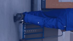 Animation of data on screens over caucasian man in warehouse. Global networks, business, finances, computing and data processing concept digitally generated video. - Powered by Shutterstock - Get 15% off with code: PIKWIZARD15