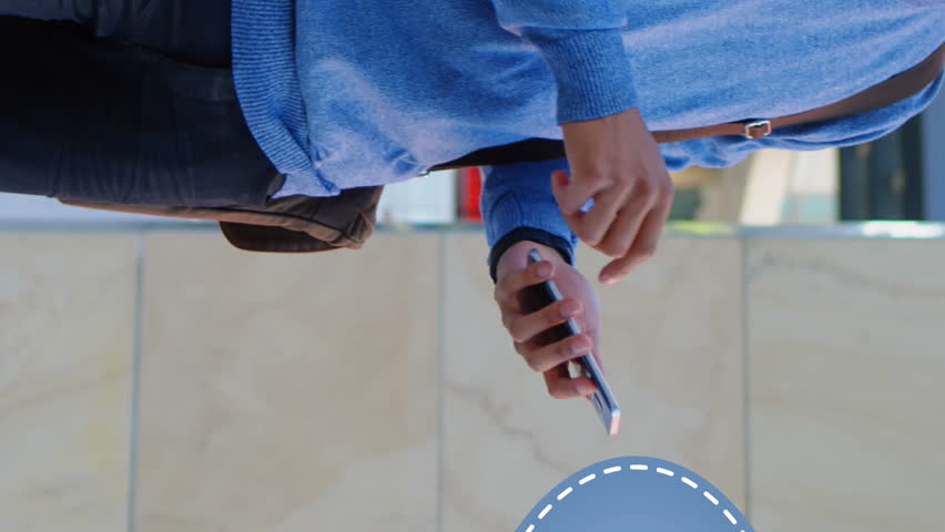 Side view of a Hispanic man leaning on a building column and texting beside a blue chat box with increasing numbers and message icon 4k