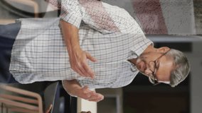 Animation of flag of usa over diverse business people in office. Global business, patriotism and digital interface concept digitally generated video. - Powered by Shutterstock - Get 15% off with code: PIKWIZARD15