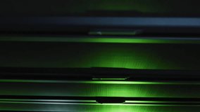 Glowing blue and green graphs and data processing over dark computer server room. Communication, business and digital interface technology, digitally generated video. - Powered by Shutterstock - Get 15% off with code: PIKWIZARD15