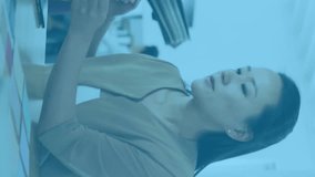 Animation of financial data processing over diverse business people in office. Global finance, business, connections, computing and data processing concept digitally generated video. - Powered by Shutterstock - Get 15% off with code: PIKWIZARD15