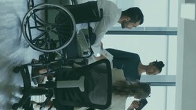 Animation of network of connections with icons over disabled and diverse colleagues at meeting. Technology, business and digital interface concept digitally generated video. - Powered by Shutterstock - Get 15% off with code: PIKWIZARD15