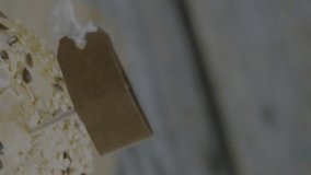 Locally grown organic food animation over close-up of sesame seed burger. farm-to-table, healthy, sustainability, eco-friendly, nutrition, natural - Powered by Shutterstock - Get 15% off with code: PIKWIZARD15