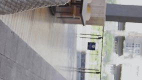 Holding bicycle, person using floating holographic keyboard animation in city setting. Futuristic, technology, urban, innovation, digital, lifestyle - Powered by Shutterstock - Get 15% off with code: PIKWIZARD15