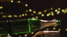 Animation of confetti, champagne and champagne glasses. New year's eve, christmas, festivity, celebration and tradition concept digitally generated video. - Powered by Shutterstock - Get 15% off with code: PIKWIZARD15