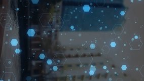 Animation of medical icons over cityscape. Global medicine and digital interface concept digitally generated video. - Powered by Shutterstock - Get 15% off with code: PIKWIZARD15