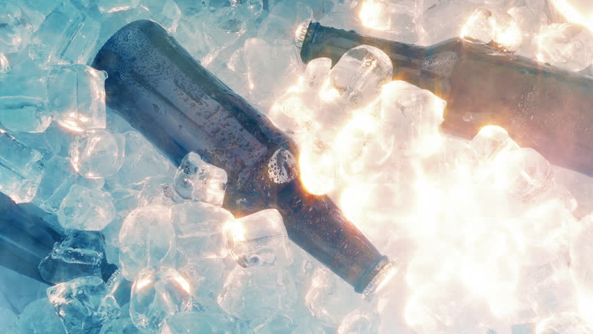 Many Beer Bottles On Ice With Cold Vapor