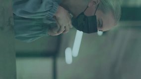 Animation of digital icons over african american male receptionist talking to caucasian woman. Business technology and covid-19 pandemic technology concept - Powered by Shutterstock - Get 15% off with code: PIKWIZARD15