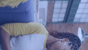 Animation of data processing and spinning globe over african american woman using laptop at office. Global networking and business technology concept - Powered by Shutterstock - Get 15% off with code: PIKWIZARD15