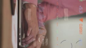 Animation of data processing over asian businessman using laptop in office. Global business, computing and digital interface concept digitally generated video. - Powered by Shutterstock - Get 15% off with code: PIKWIZARD15