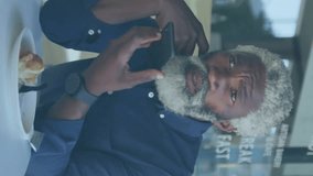 Animation of social media notifications over senior african american man using smartphone. Digital interface, connection, social network, lifestyle and communication, digitally generated video. - Powered by Shutterstock - Get 15% off with code: PIKWIZARD15