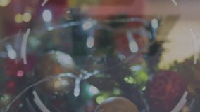 Animation of data processing and processing circle over christmas decoration. christmas, celebration, data processing and technology concept digitally generated video. - Powered by Shutterstock - Get 15% off with code: PIKWIZARD15