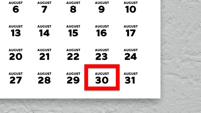 The date August 30th marked with a red cursor on the wall calendar 2025