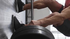 Animation of diagrams and data processing over caucasian sportsman lifting weight bar at gym. Technology, sport and digital interface concept digitally generated video. - Powered by Shutterstock - Get 15% off with code: PIKWIZARD15