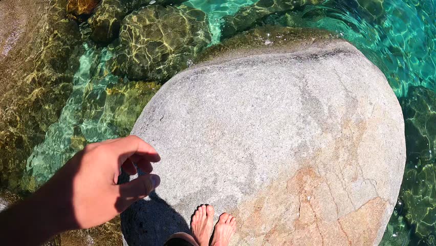 PoV  Jumping  Slow Motion Action Camera
from rock into the sea underwater  