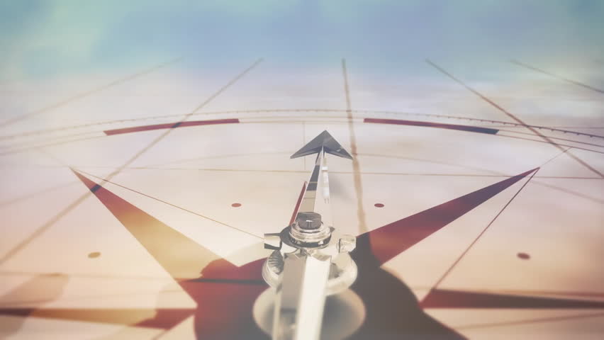 Camera pulling back showing 3D compass dial and metallic arrow turning clockwise revealing map grid. Navigation, exploration, technology, precision, adventure, direction, innovation