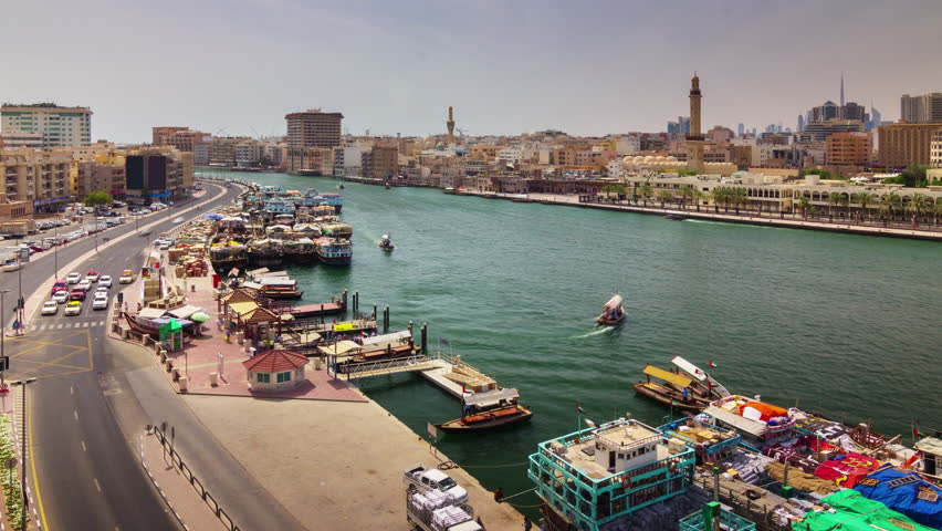 summer day dubai deira bay ship park traffic road 4k timelapse uae