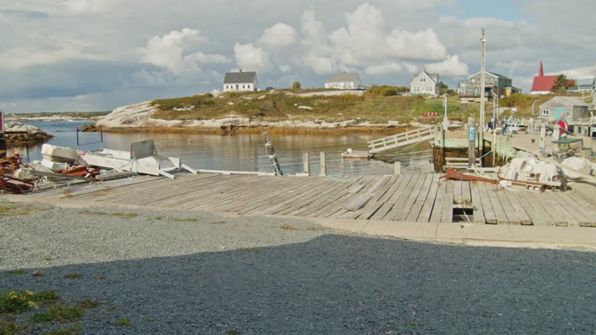 With Its Classic Red-And-White Lighthouse Perched On The Rocks, Peggys Cove Embodies The Essence Of Canada Eastern Shore, Drawing Admirers Of Natural Landscapes And Seaside Atmosphere