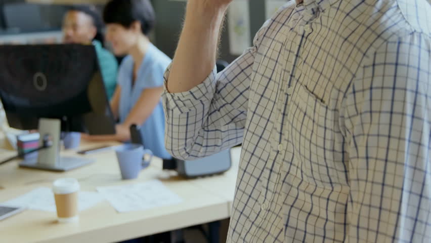 Office worker lifting smartphone and speaking, spawning clock interface with social media widgets. Technology, communication, digital, innovation, collaboration, professional, interface